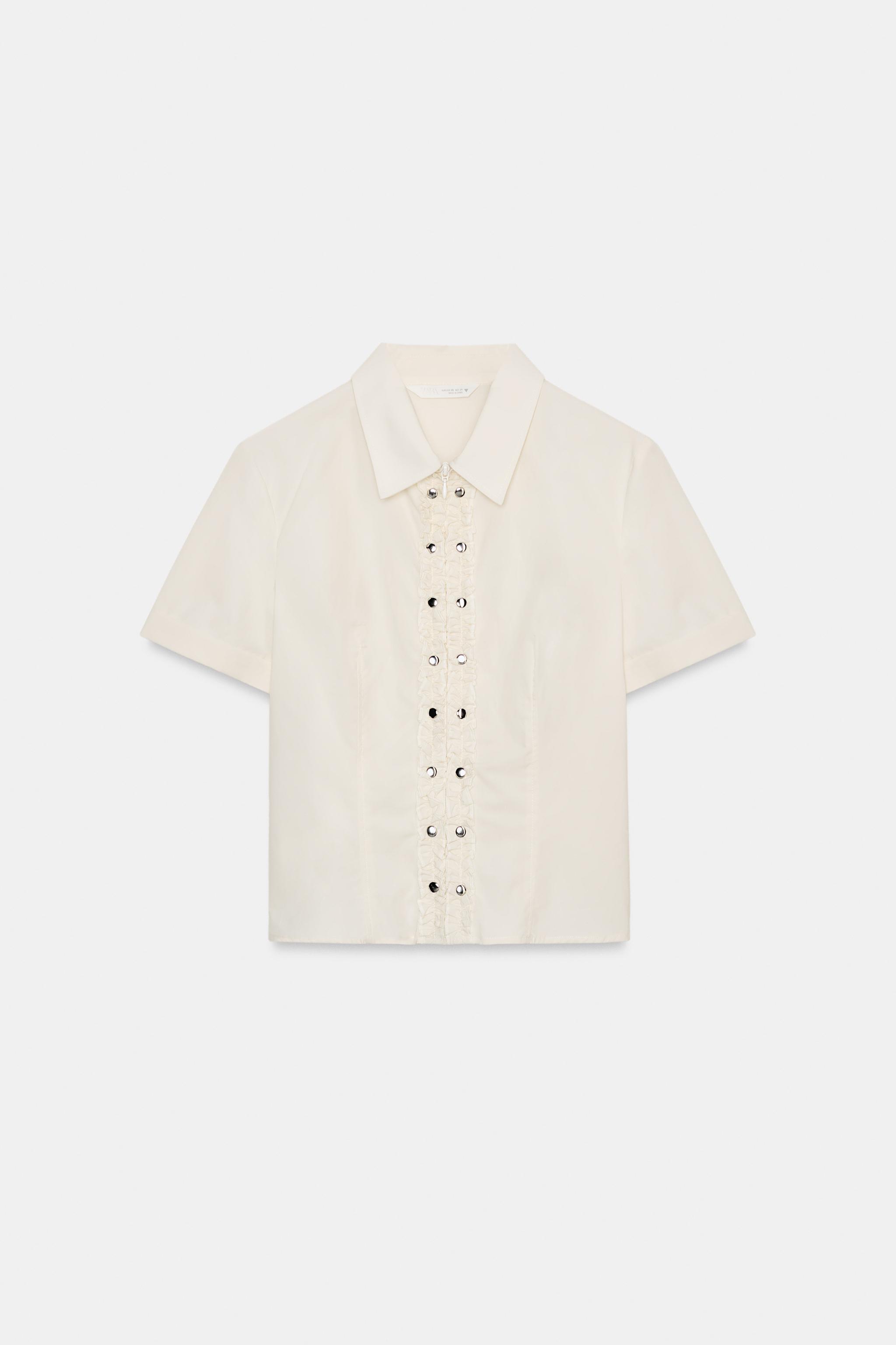 CHEMISE EN POPELINE À VOLANTS ET CLOUS